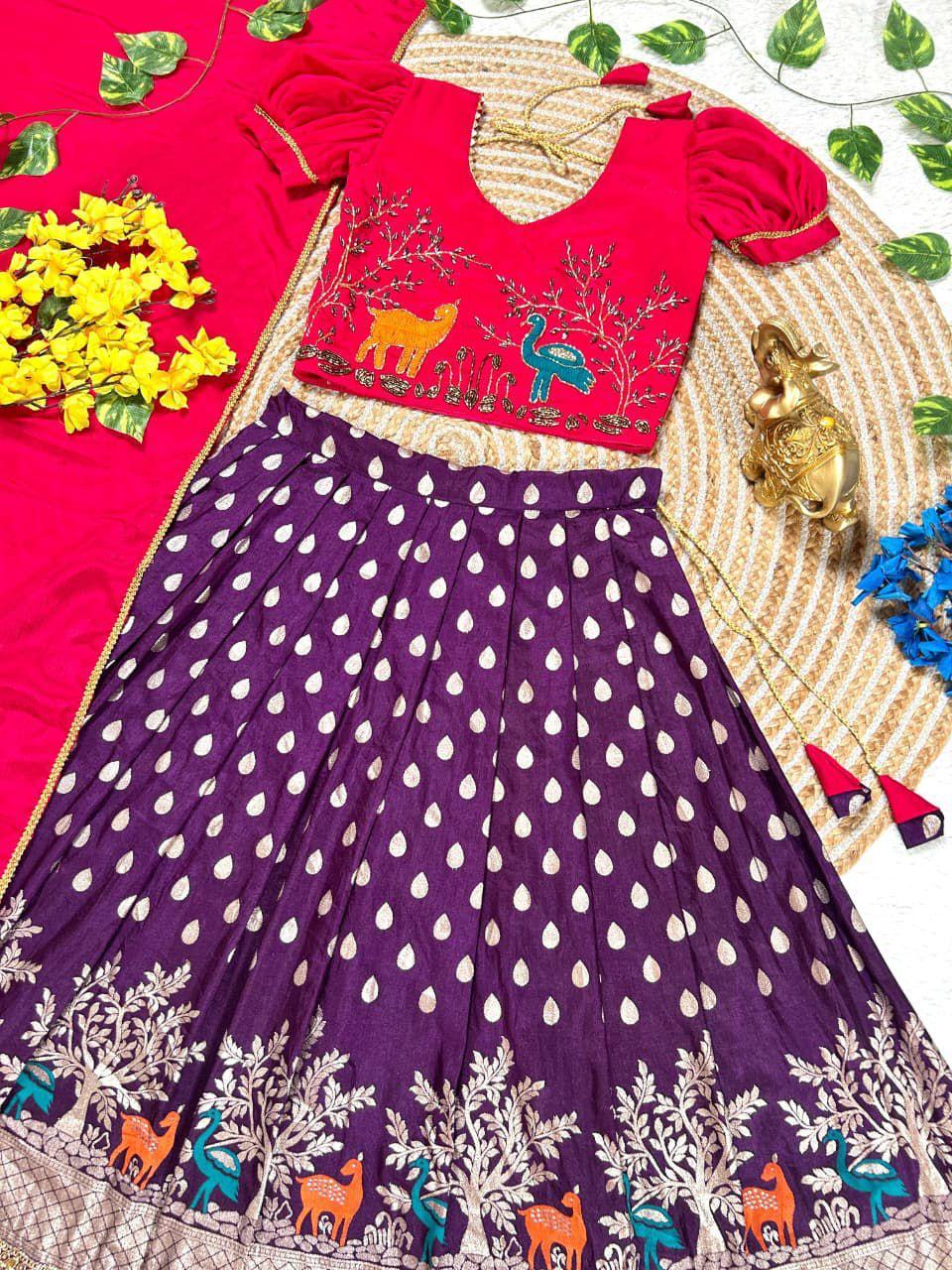 Girls Maggam work blouse paired with a golden zari pure tissue silk skirt