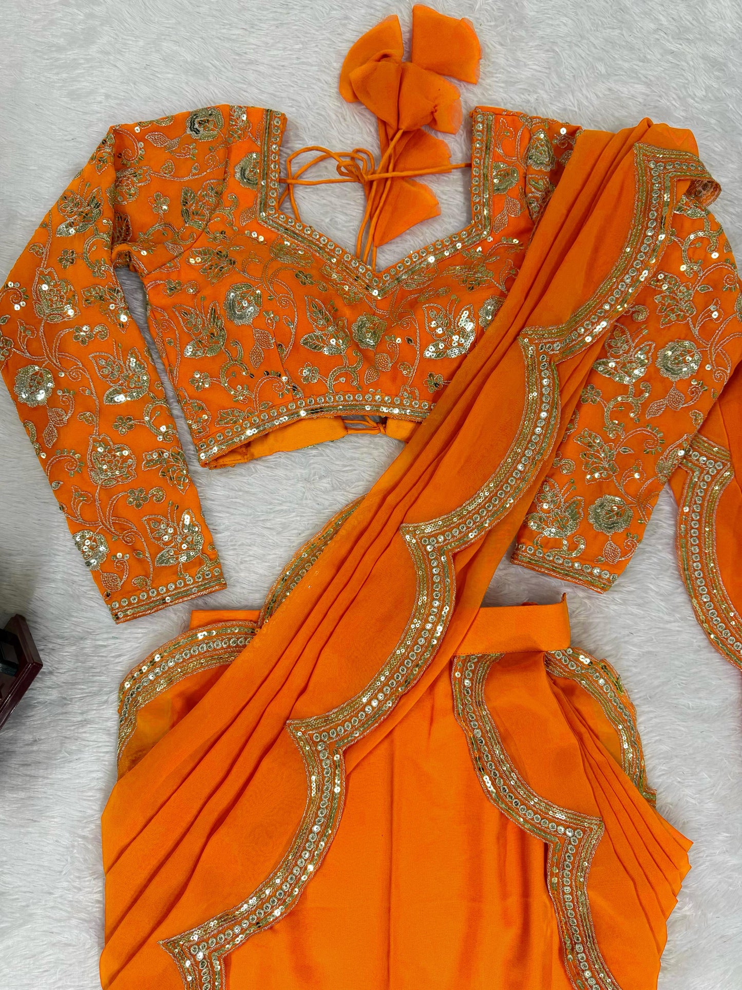 Orange Faux Georgette Ruffle Saree with Sequin Embroidery