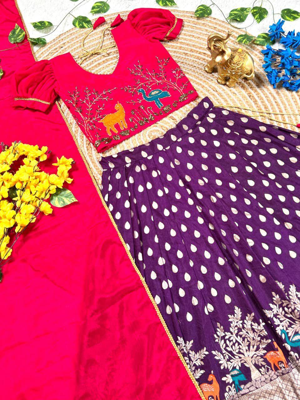 Girls Maggam work blouse paired with a golden zari pure tissue silk skirt