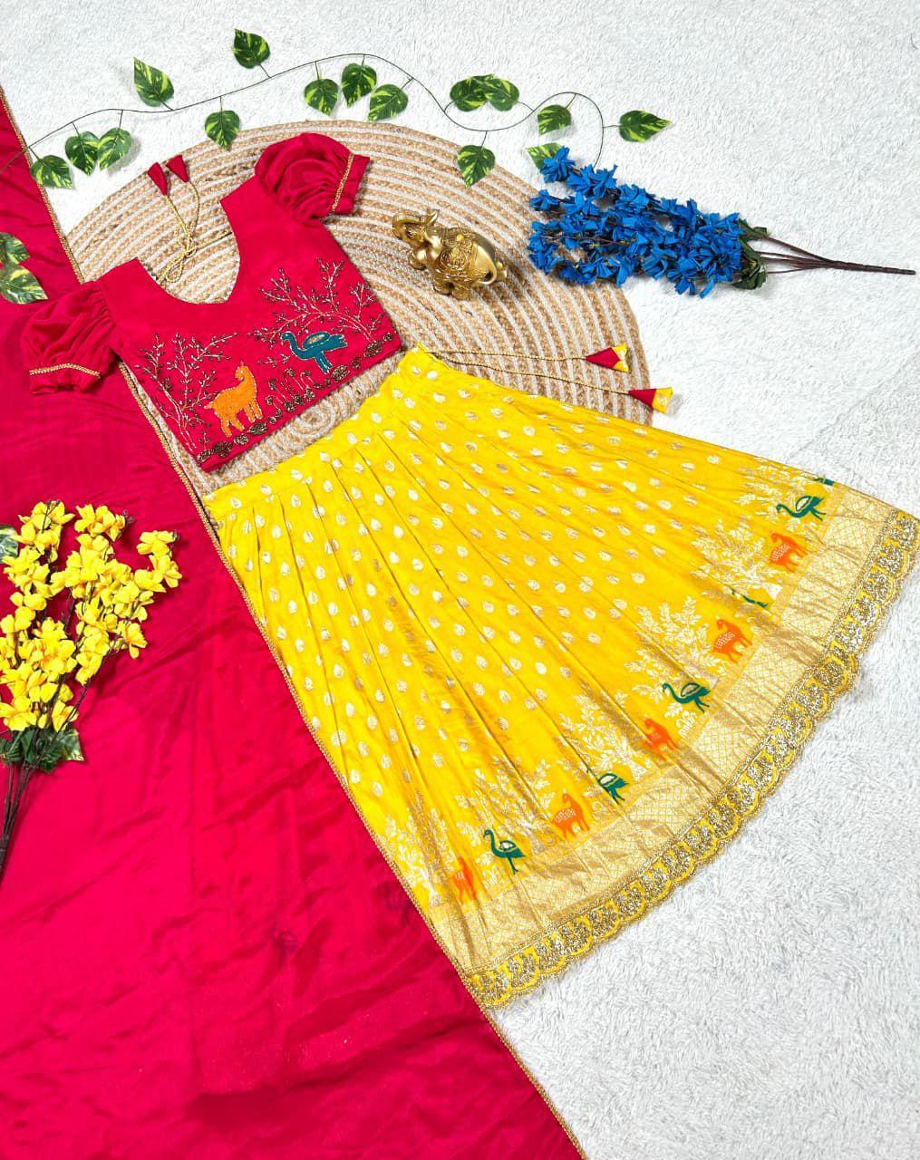 Girls Maggam work blouse paired with a golden zari pure tissue silk skirt