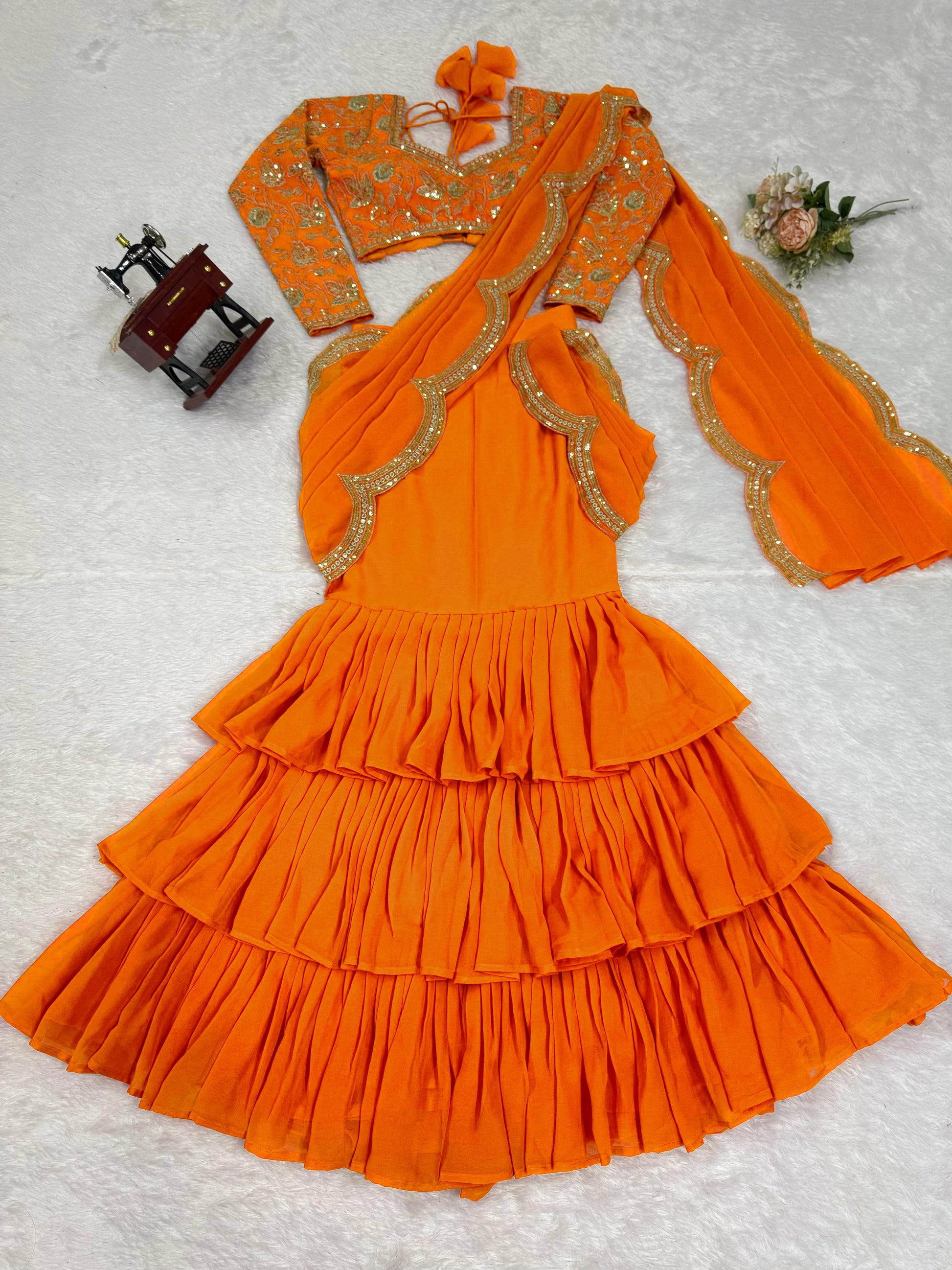 Orange Faux Georgette Ruffle Saree with Sequin Embroidery